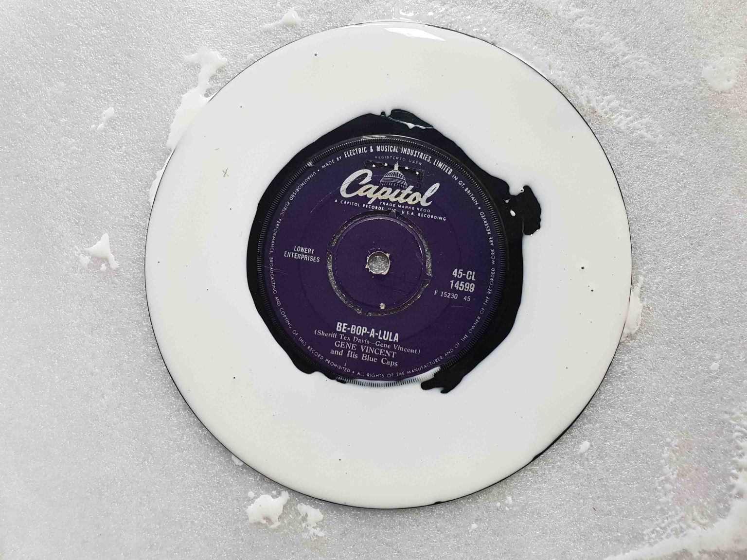 Cleaning a record with glue! Zeta Services